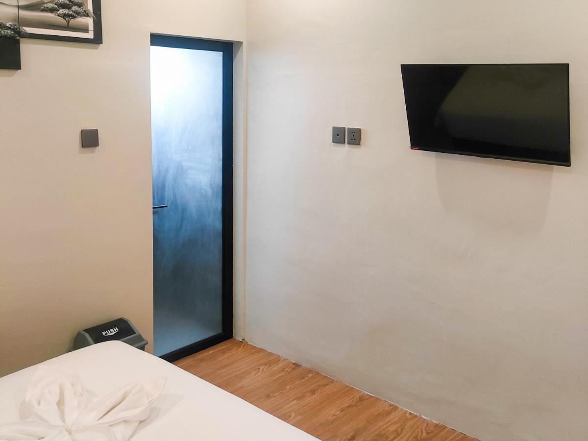 Travel Biz Hotel Medan Mitra Reddoorz Exterior foto
